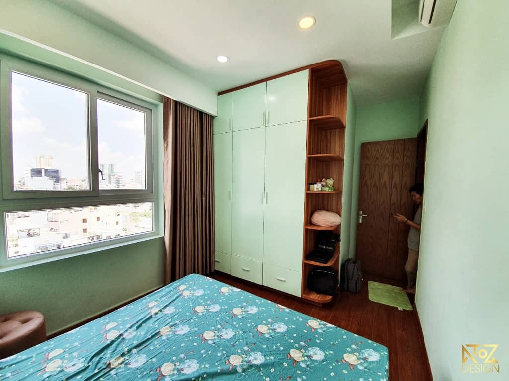 Tông màu xanh chủ đạo của phòng ngủ khá phù hợp vời tông màu của nội thất